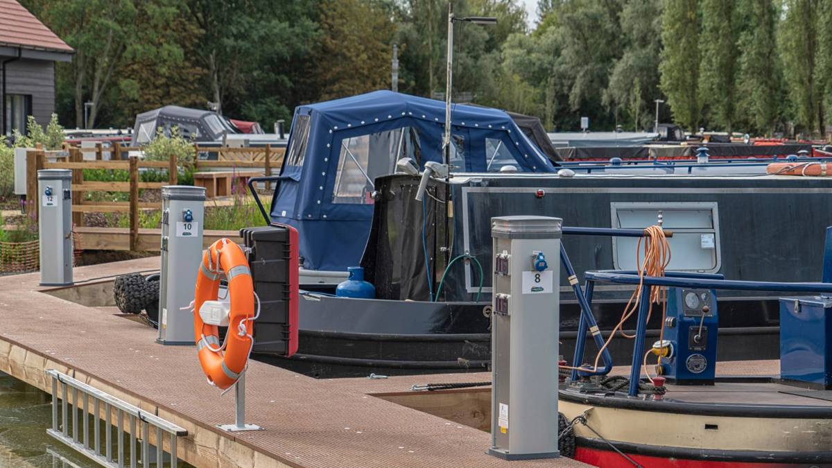 Mooring points at the marina with boats