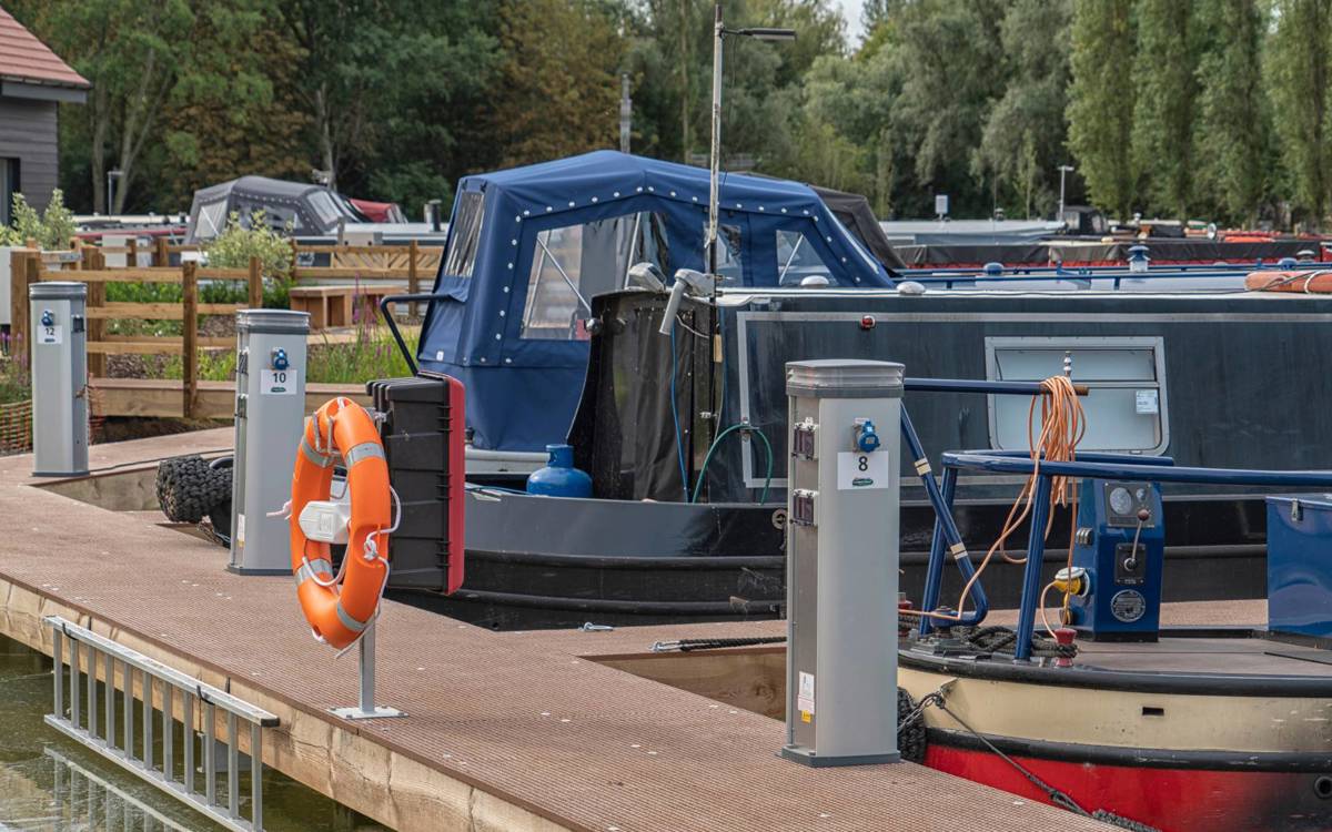 Mooring points at the marina with boats